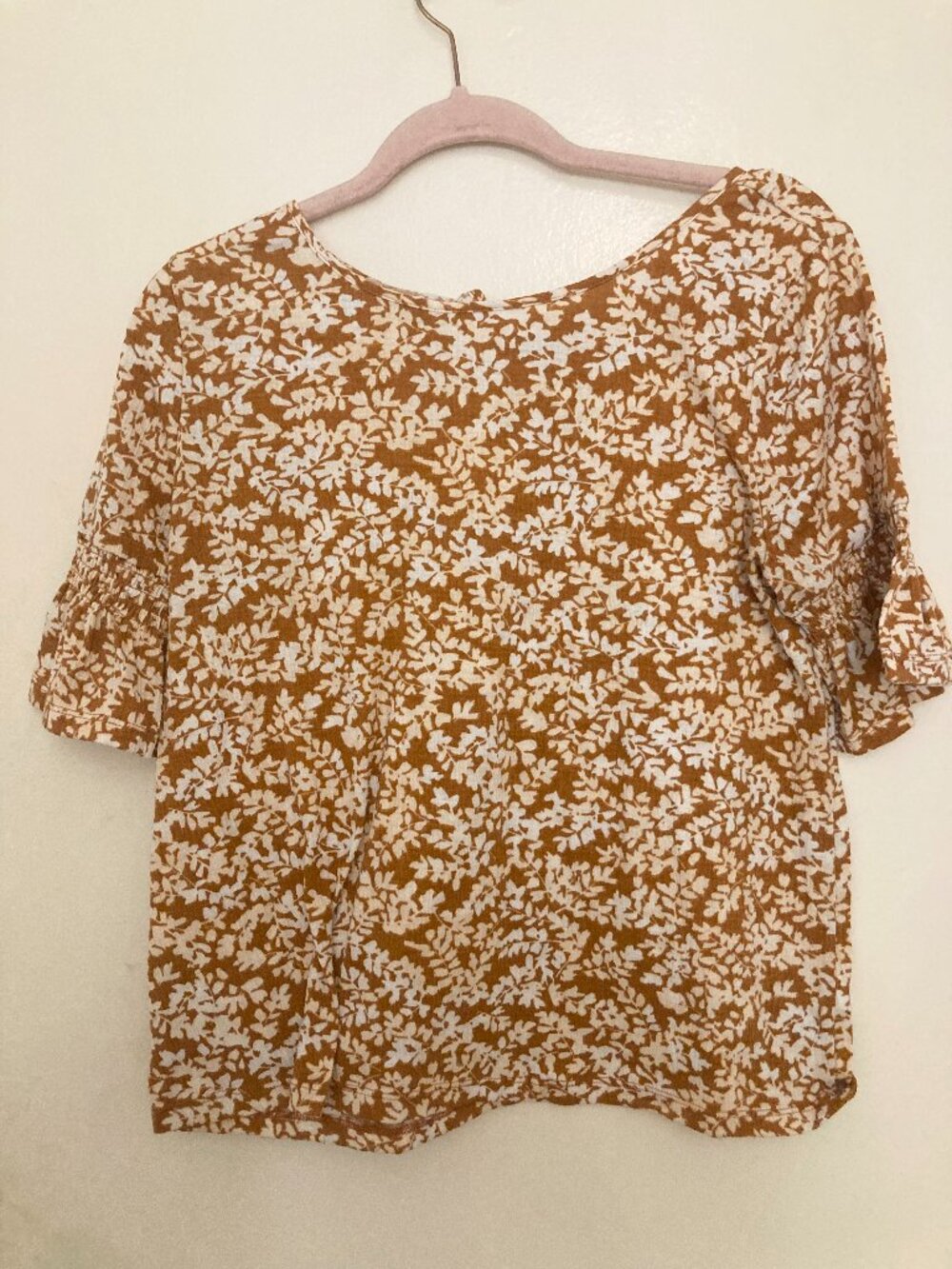 Orange Blouse with White Leaf Pattern